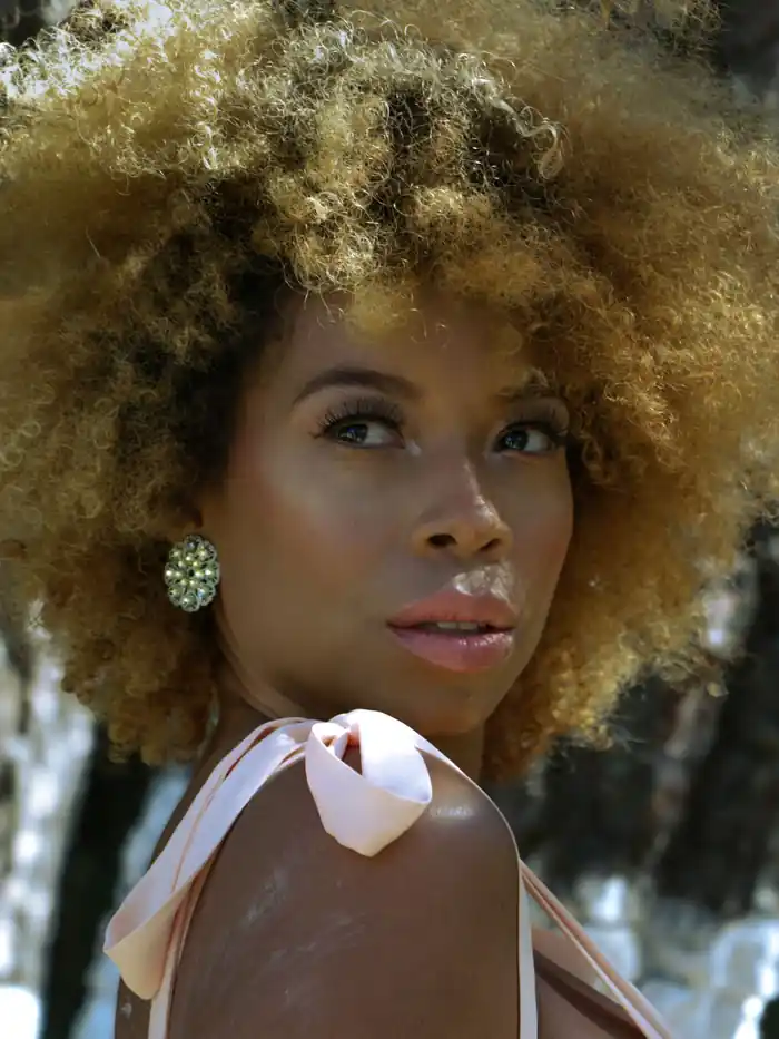 Curly hair with honey-caramel highlights