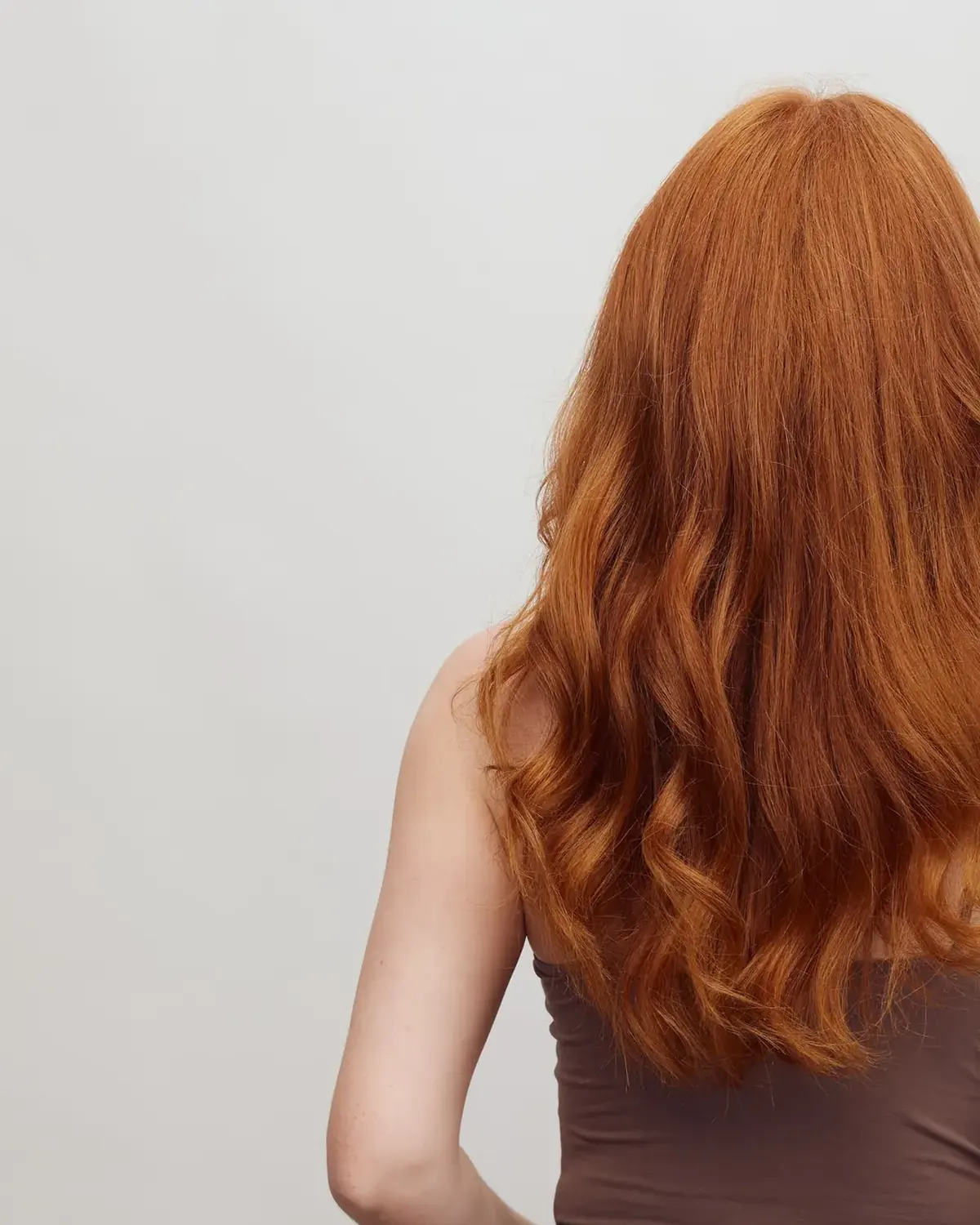 Long copper-toned hair after a colour appointment